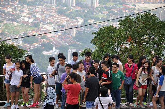 Image: Chinese tourists in Georgetown, Malaysia ©Shankar S, licensed by Creative Commons via flickr