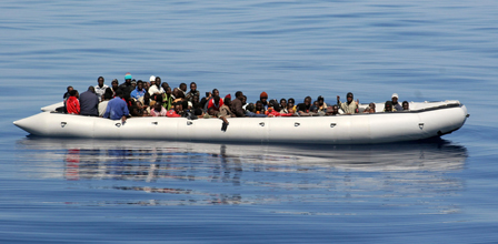 87 migrants crammed into an inflatable craft in the Mediterranean Sea, near the island of Lampedusa. Image credit: Zodiac © Noborder Network. Licensed under creative commons via flickr.
