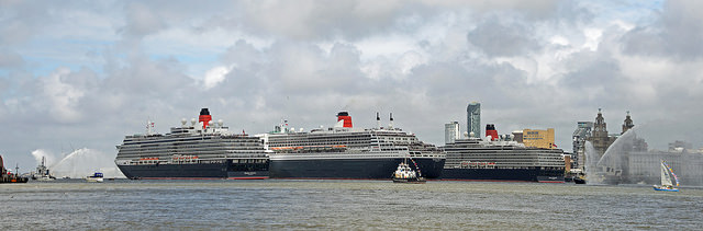 The Cunard ‘Three Queens’ (The Queen Mary 2, Queen Elizabeth and Queen Victoria) in Liverpool. Image: The Three Queens by Andrew, licensed under Creative Commons via flickr
