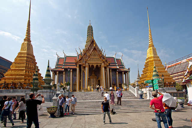 The Grand Palace, Bangkok (pictured here) is a popular tourist destination but tourist arrivals in Thailand have dropped 17 per cent in the weeks following 17th August bomb attack. Image: Grand Palace by Andrea Schaffer licensed under creative commons via flickr.